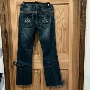Cowgirl Tuff Jeans size 27x35 but daughter cut off like two inches. More like 33